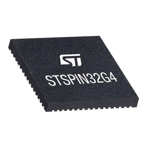Closeup view of a black STSPIN32G4 integrated circuit chip.