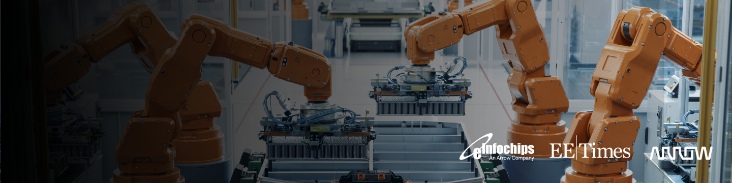 The image shows several orange robotic arms operating on an automated assembly line in a modern factory setting. 