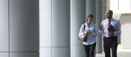 Business Colleagues Walking Outdoors