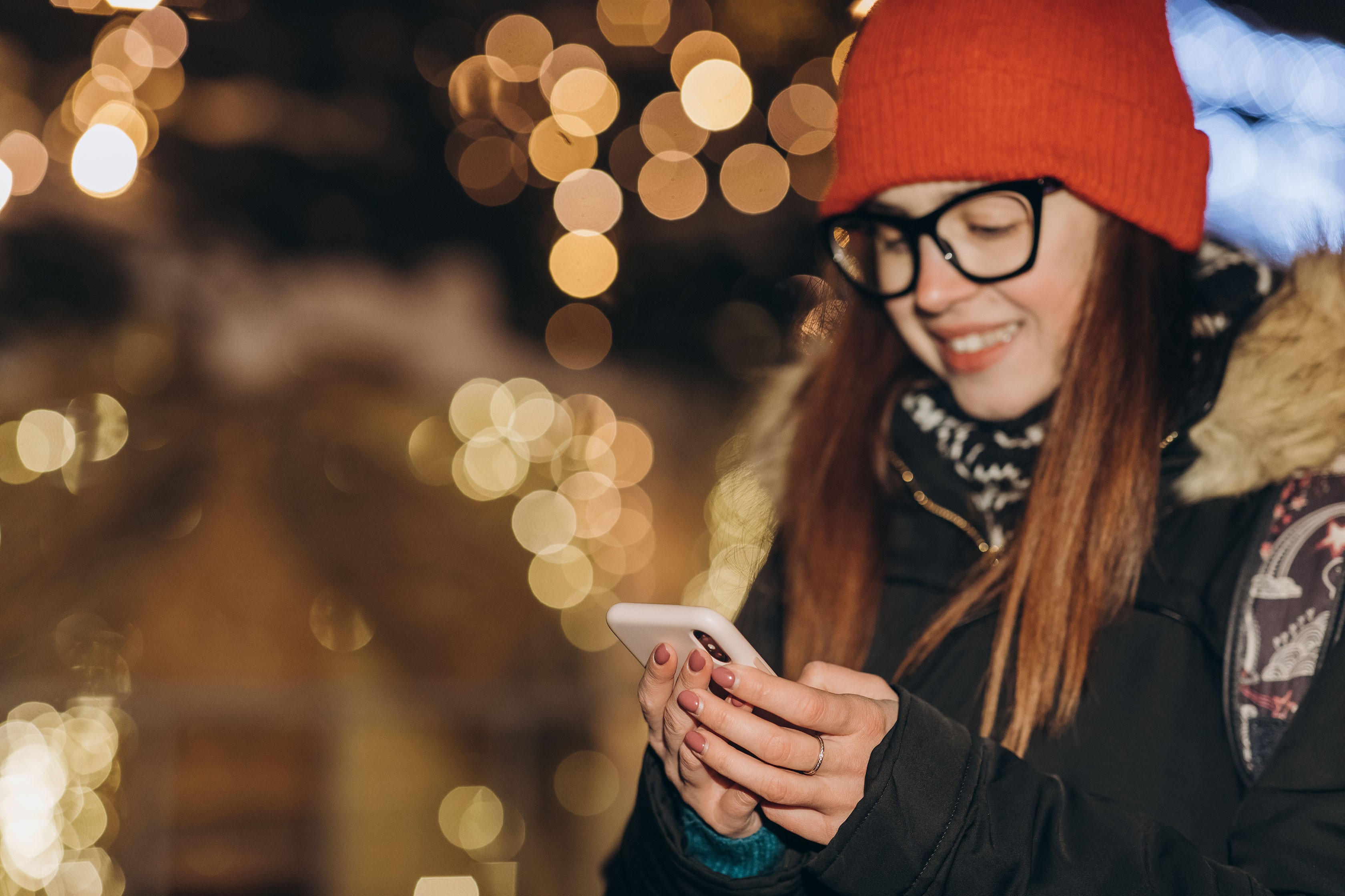 Young_Woman_in_Winter_Hat_on_Phone