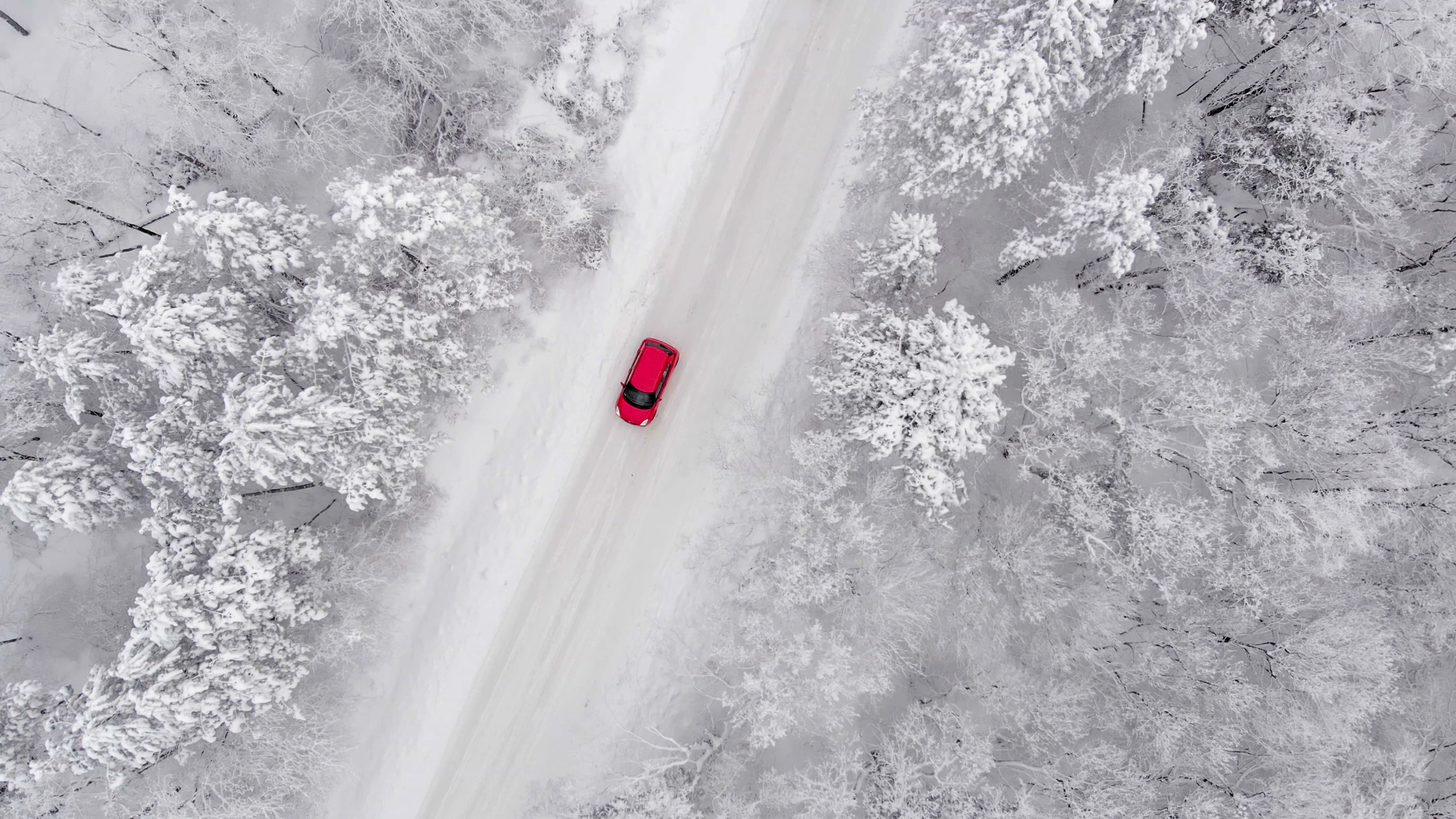 Red Car On Winter Road