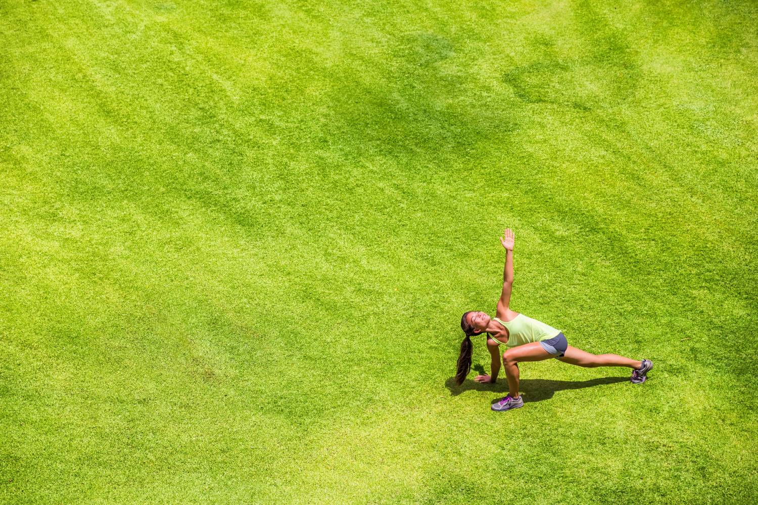 Female Runner Stretching